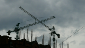 A large machinery looming over a construction site.