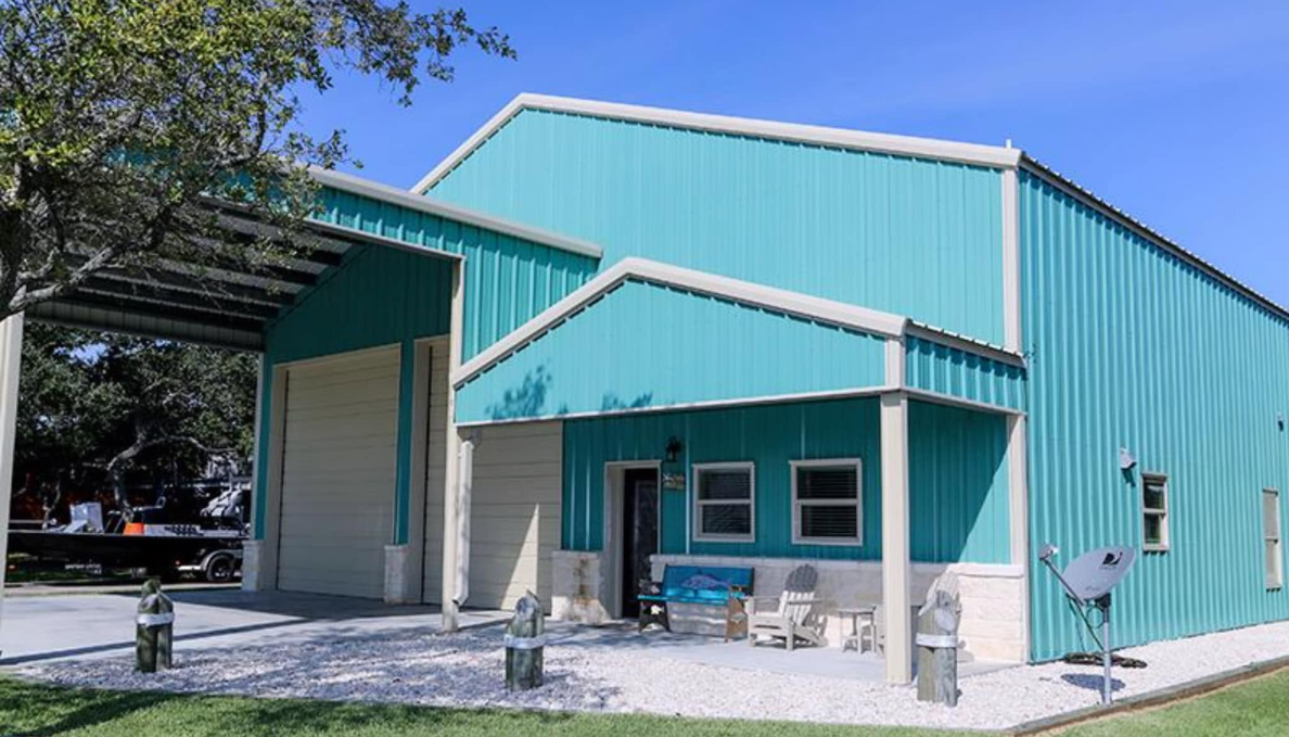 A blue barndominium home 