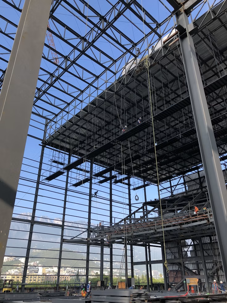 A large building with steel and barndominium material. 