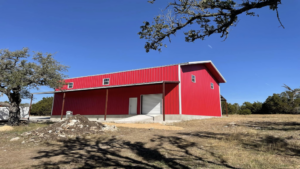 A metal building with red walls
