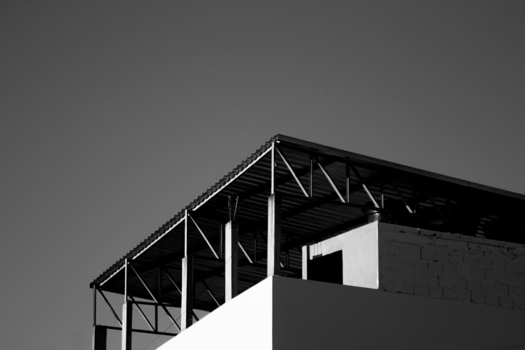 A large metal building with a shade.