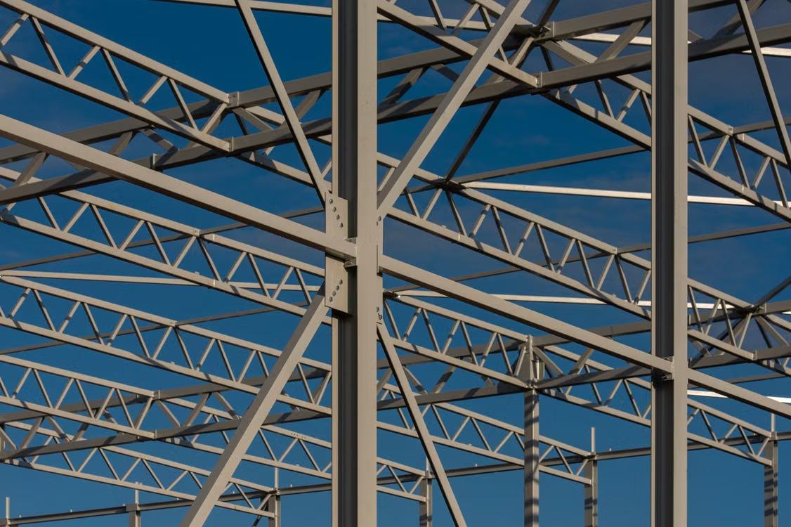 close-up of metal framework for a storage space under the blue sky