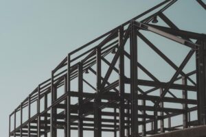 close-up of structural steel frames against a clear sky